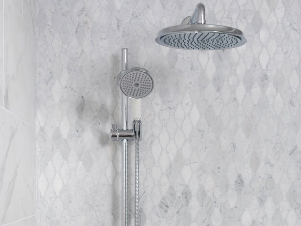 Gray and white shower tile
