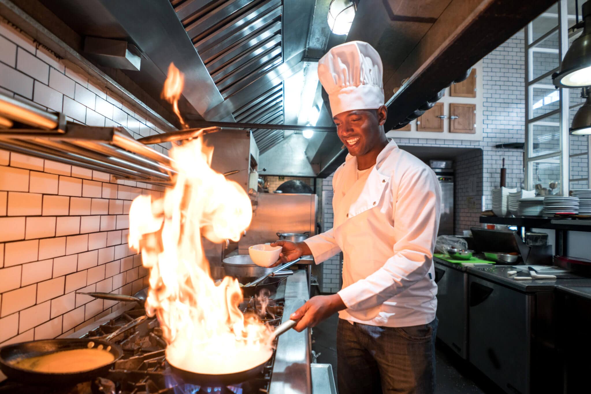 Chef flaming food at a restaurant