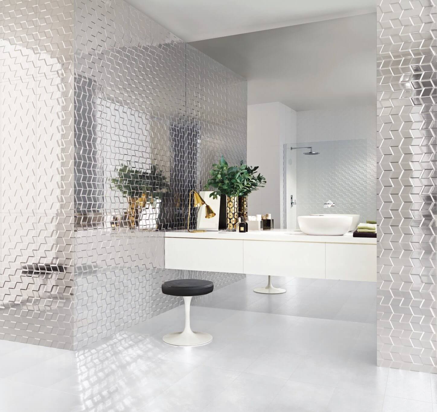 Shower tile designs with high-glam chrome metallic 3D mosaic wall tiles extending from vanity to shower