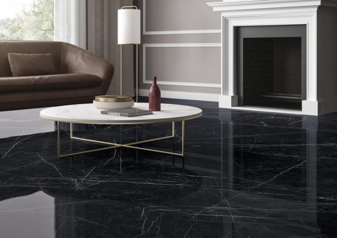 Living room with black marble-look tile flooring