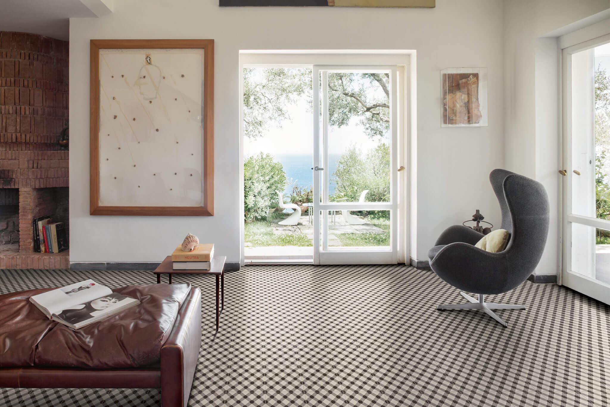 Bedroom with a black and white pattern ceramic tile flooring