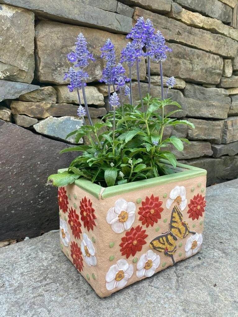 colorful planter box with flowers and butterflies design, handmade with ceramic tile made by Mandy Baker