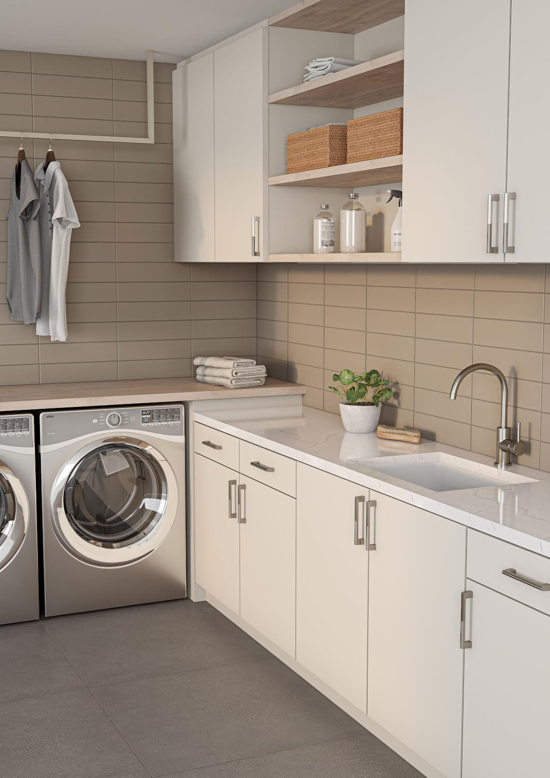 laundry room with earthy wall and flooring ceramic tile