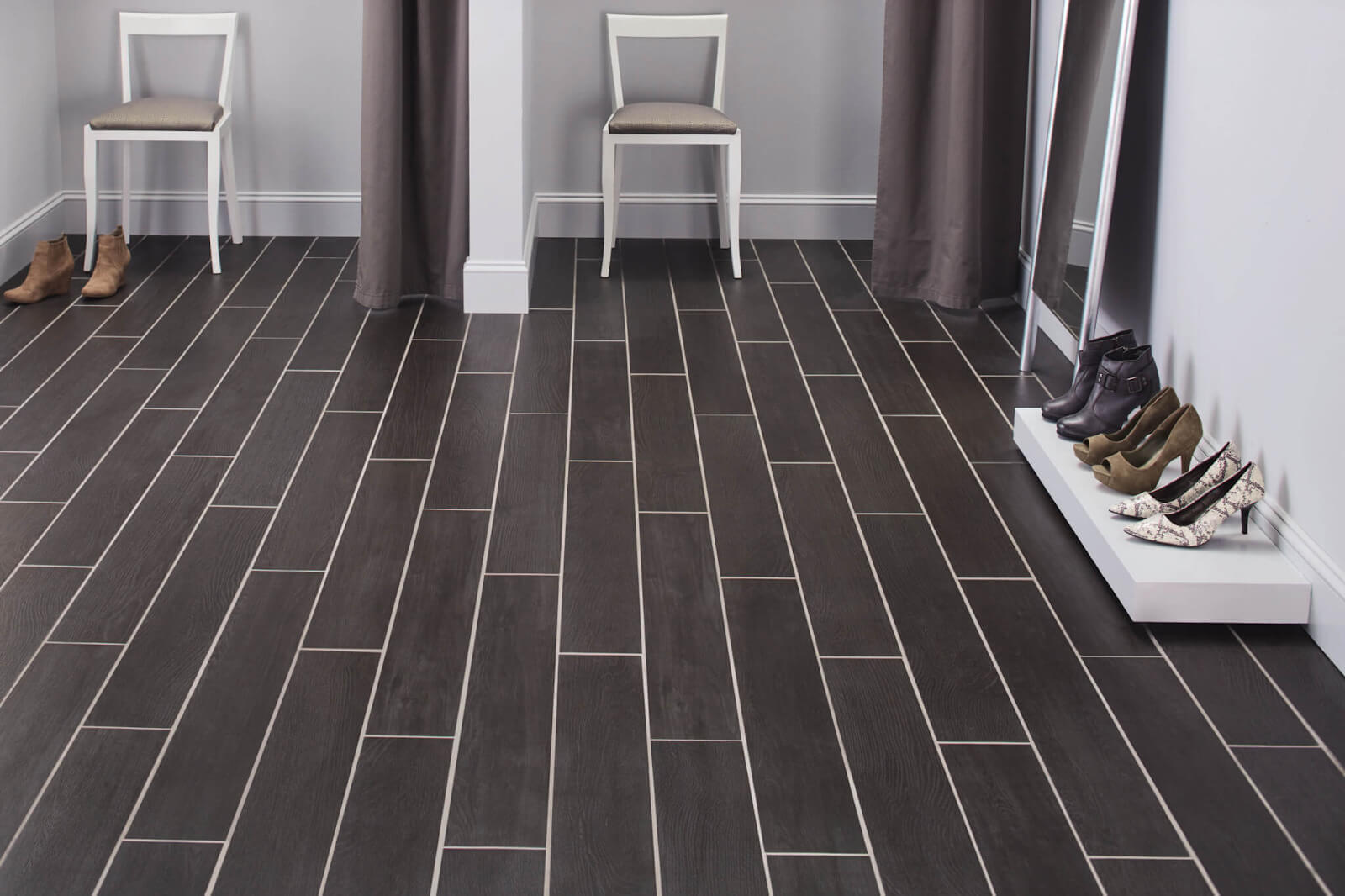Black wood look tile with white grout