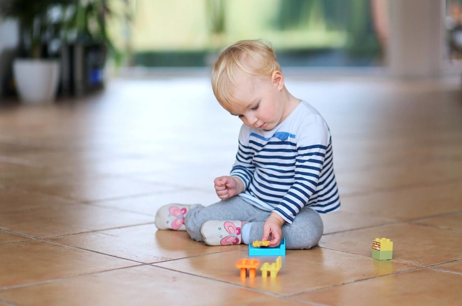 Baby playing on the floor