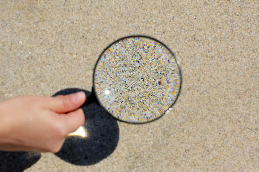 Magnifying glass over tile