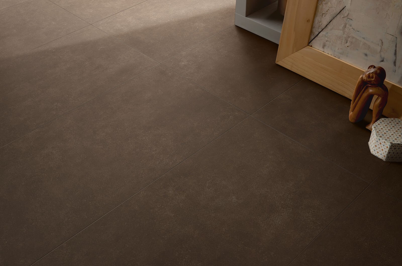 Espresso-toned plaster-look tile flooring