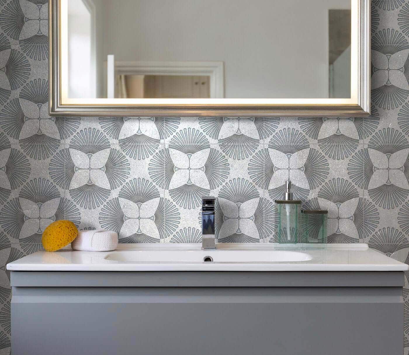 Beautiful gray tile used as wallpaper above a sink