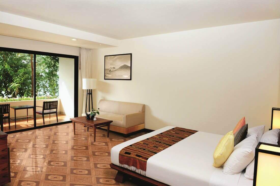 Hotel room with colorful ceramic tile flooring
