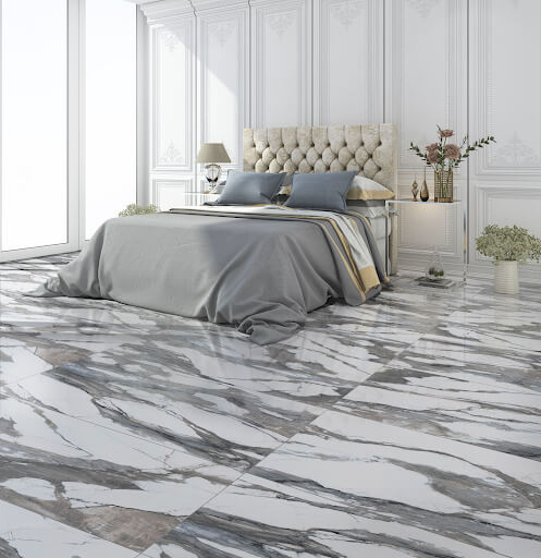 Bedroom with White marble-look tile and gray veining