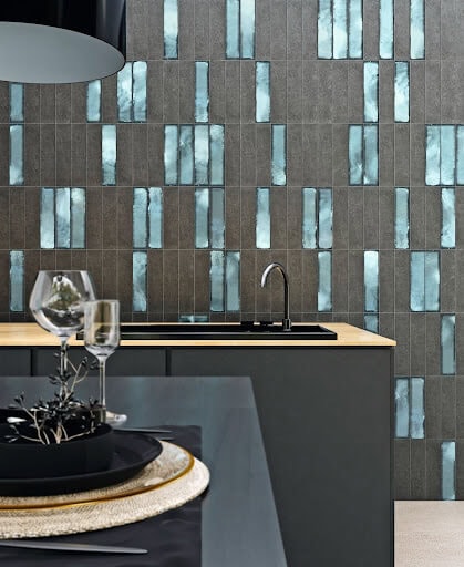 Kitchen with black and blue vertical tiles