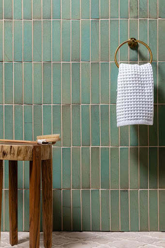 Green vertical bathroom tile grid