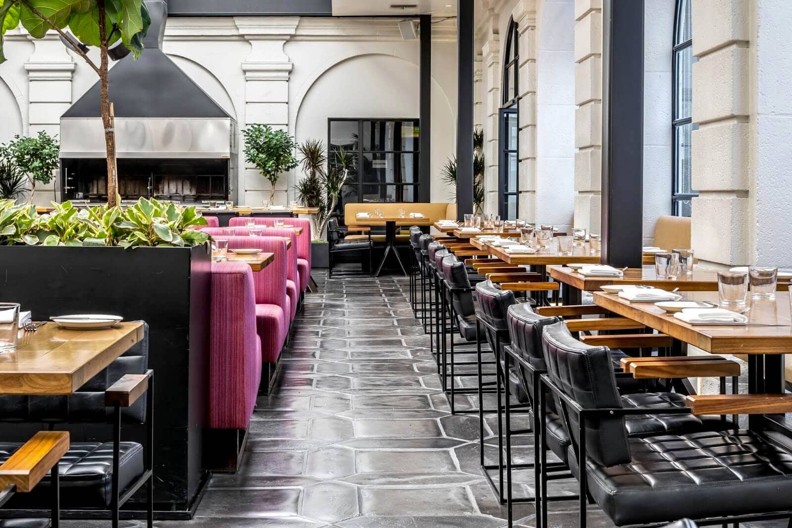 Elegant restaurant with adapted picket fence floor tile pattern