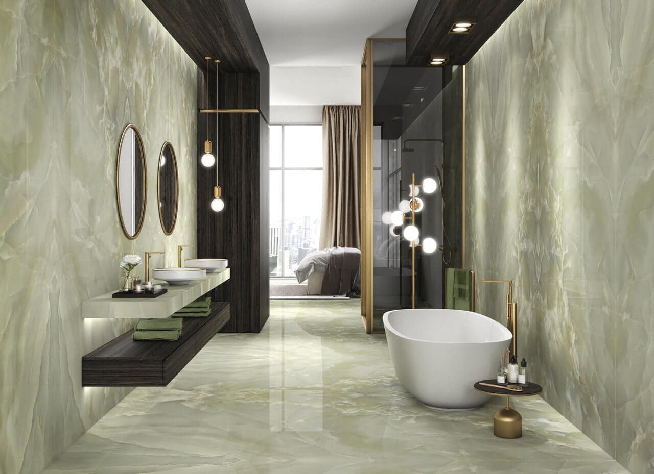 Large-format gauged porcelain tile panels for a minimalist bathroom design 
