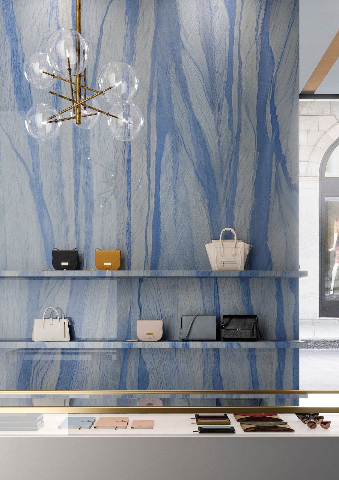 Porcelain and ceramic tile feature wall with integrated shelving for a retail application