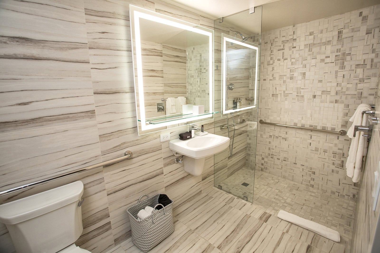 Bathroom with porcelain and ceramic tile design, from mosaic shower tiles to large-format wall tiles