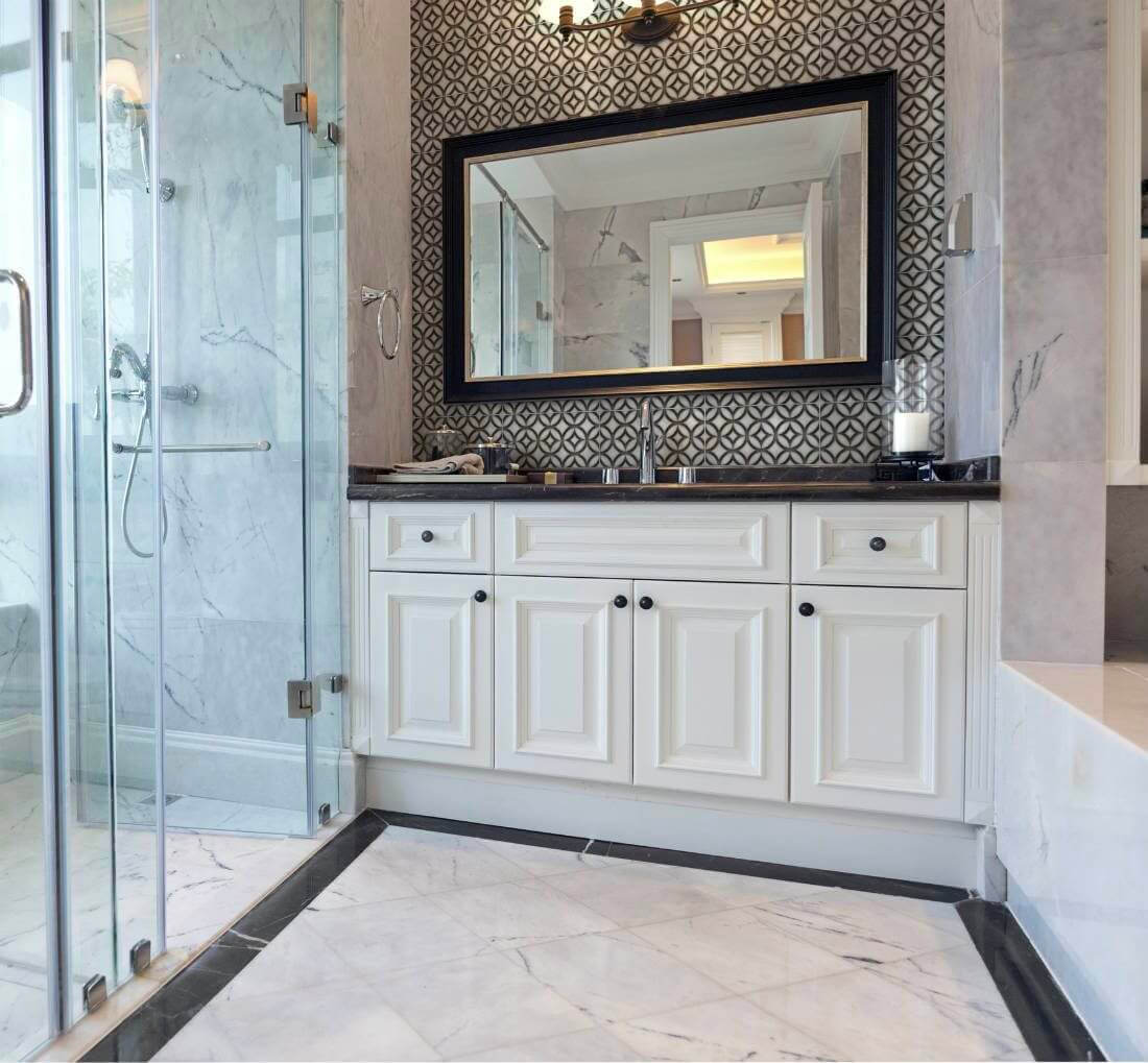 Spacious black and white tile backsplash pattern with circles and diamonds for bathroom

