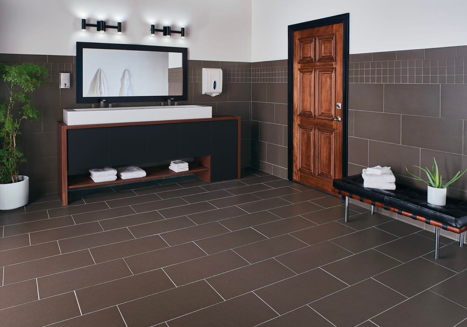 Large brown subway tile with a mini grid border for zen bathroom