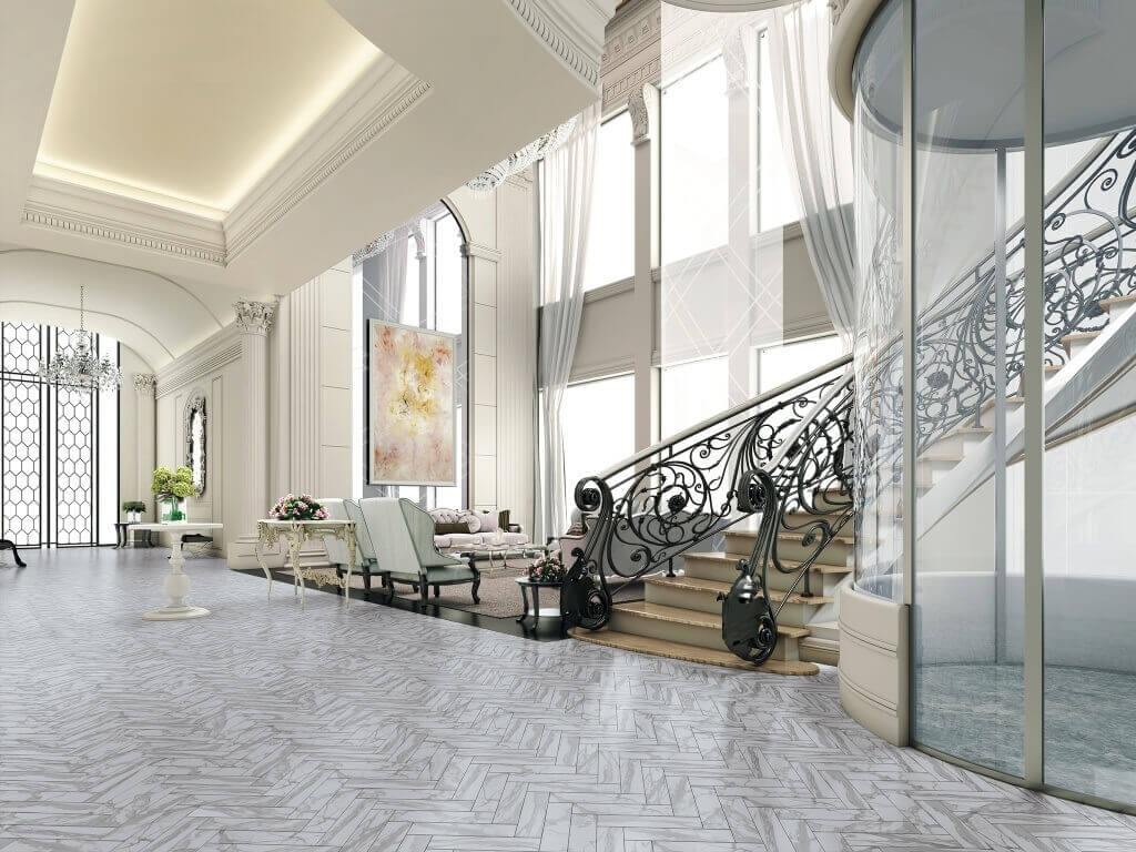 Elegant, marble-look ceramic tiles in a herringbone pattern for hotel lobby
