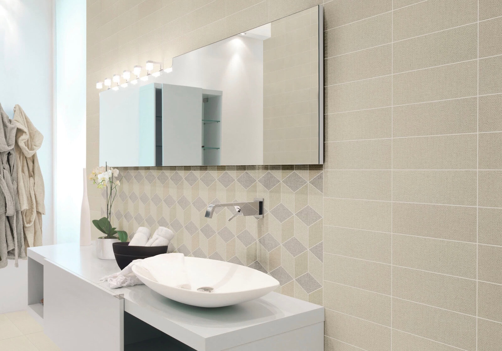 Modern sink bathroom with linen-look tile with a 3D cube pattern
