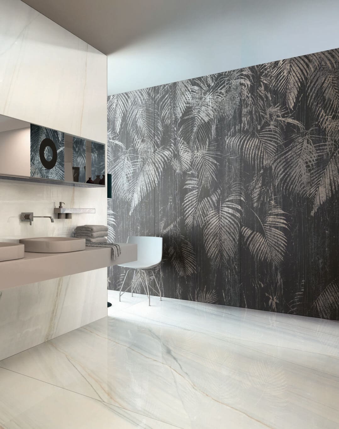 Modern bathroom wall with white gauged porcelain tile slabs in a marble look

