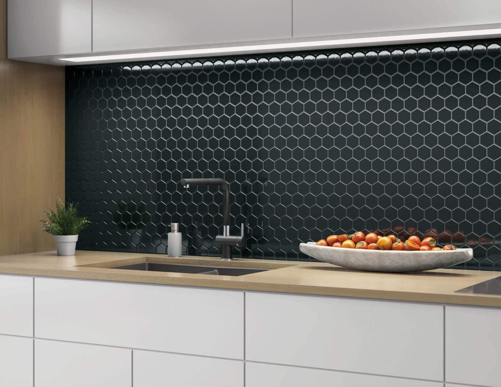 Black mosaic hexagon tile kitchen backsplash