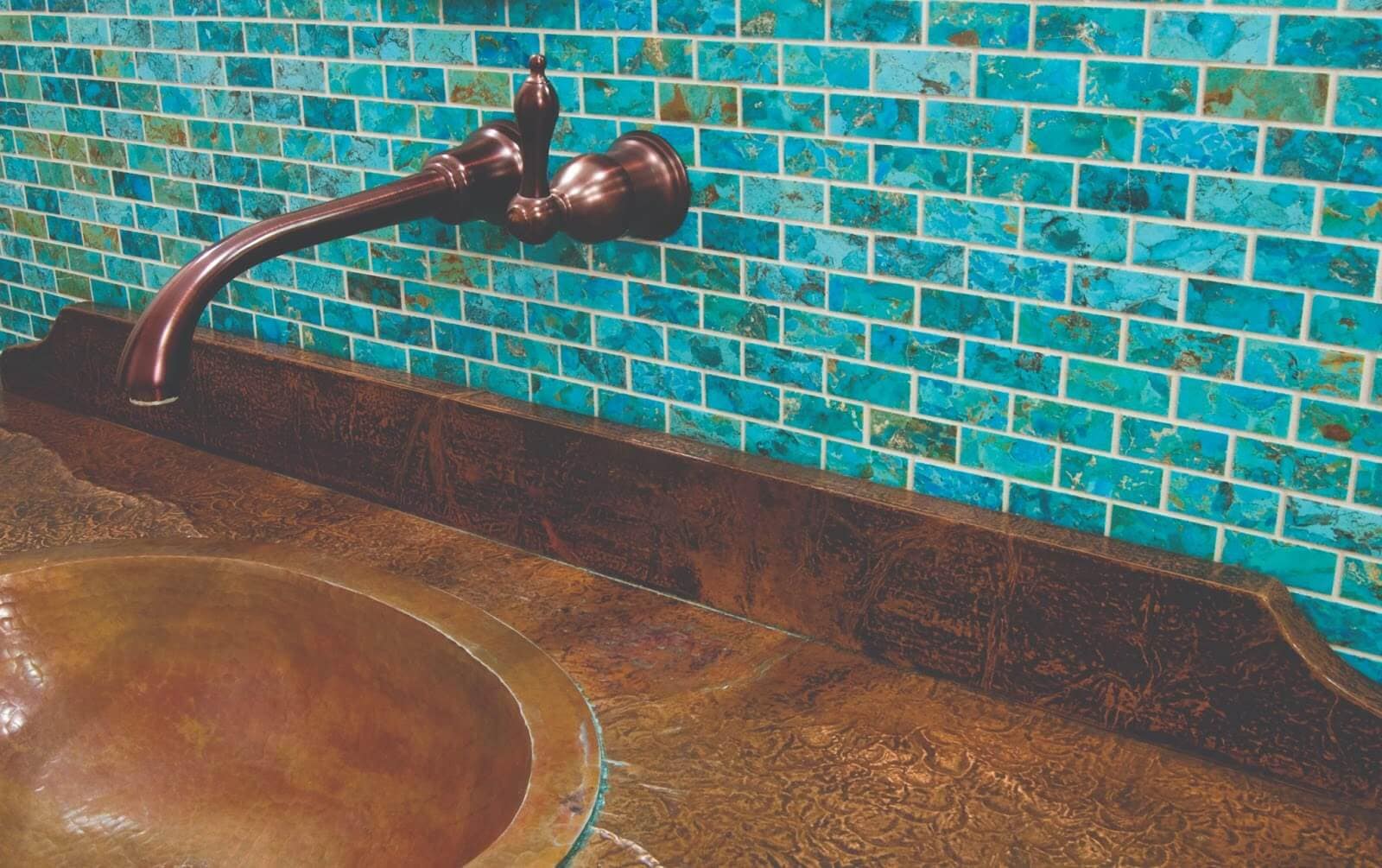 Turquoise subway tile bathroom backsplash in a natural look