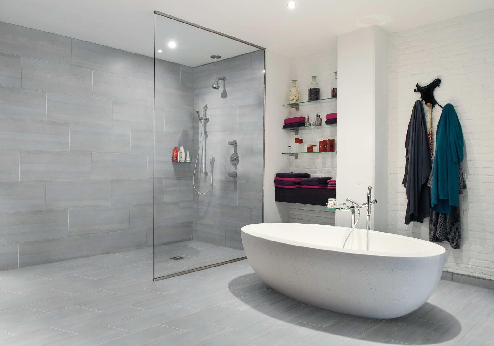 minimalist bathroom with curbless shower and ceramic tile flooring for easier cleaning