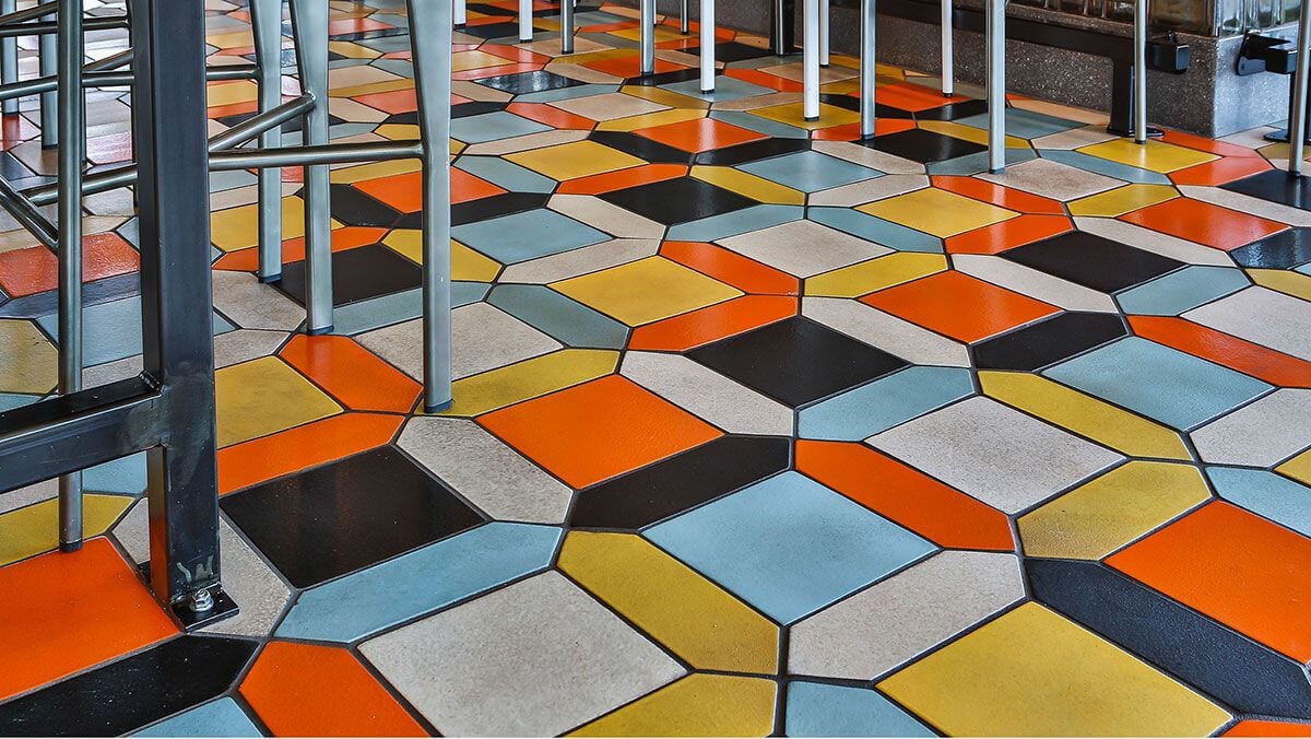 Square tile combined with different shapes on a restaurant floor