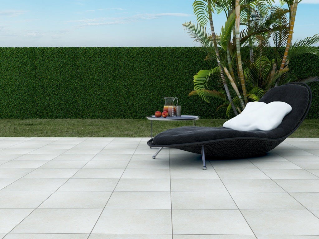 outdoor relaxation space with concrete-look tile flooring