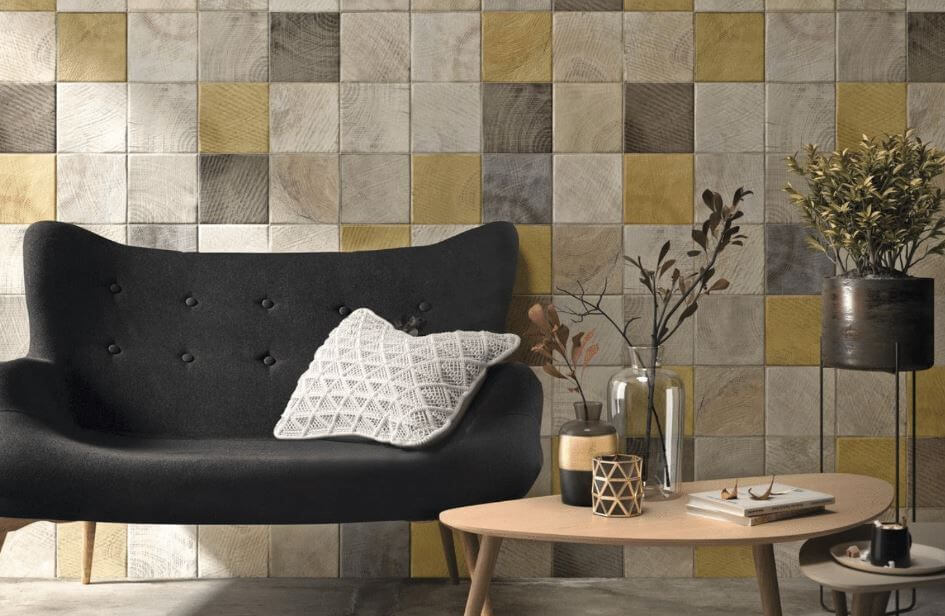 Multicolored Tile Wall With Grays and Yellows for waiting room space
