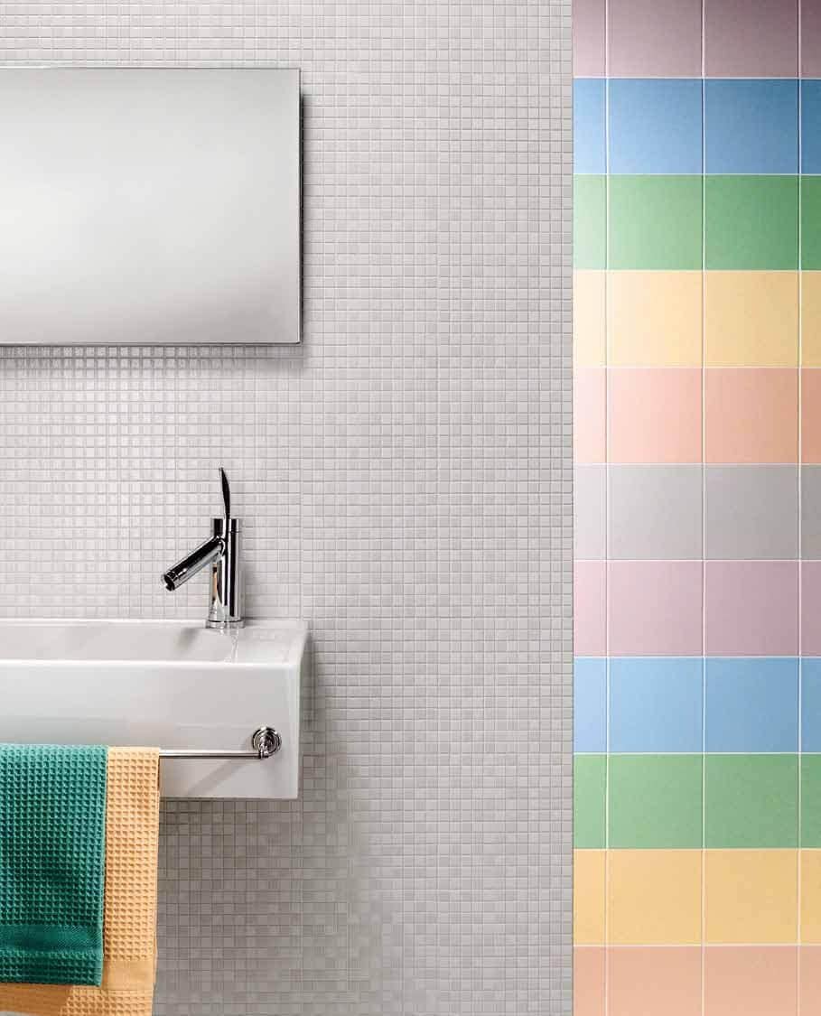 Multiple sizes of square tile on a bathroom wall