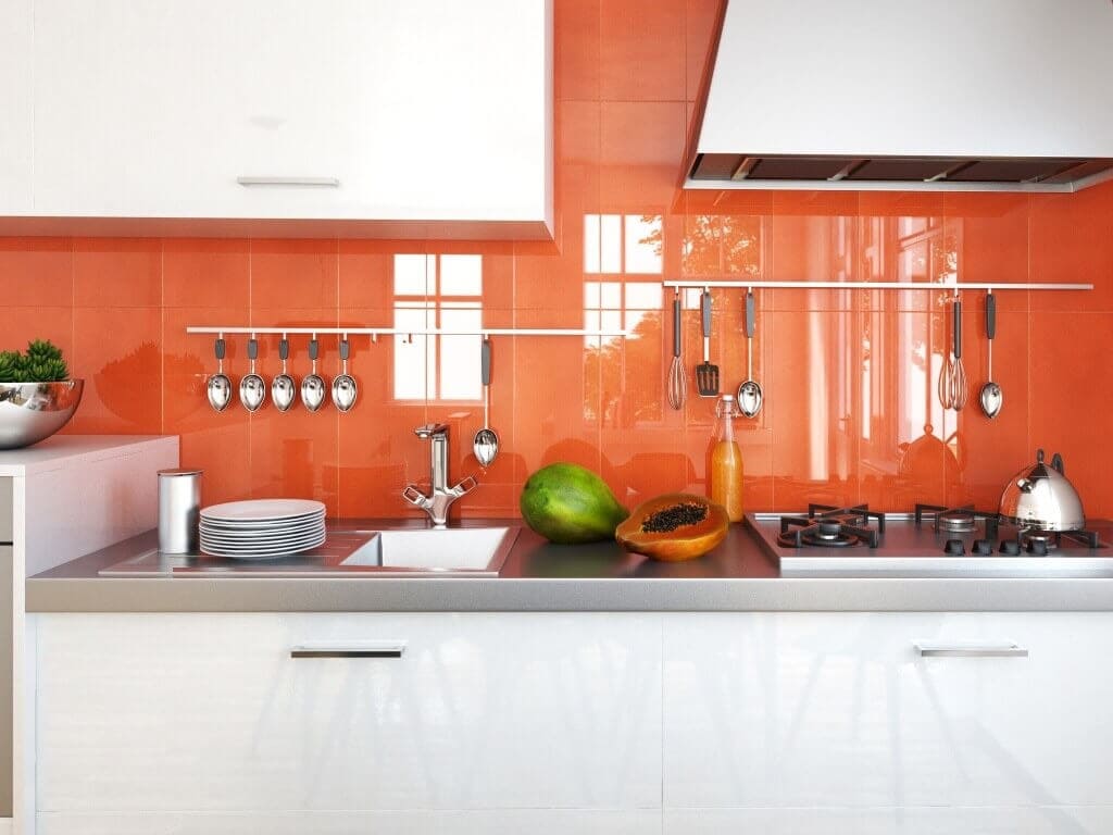 kitchen with orange wall tile