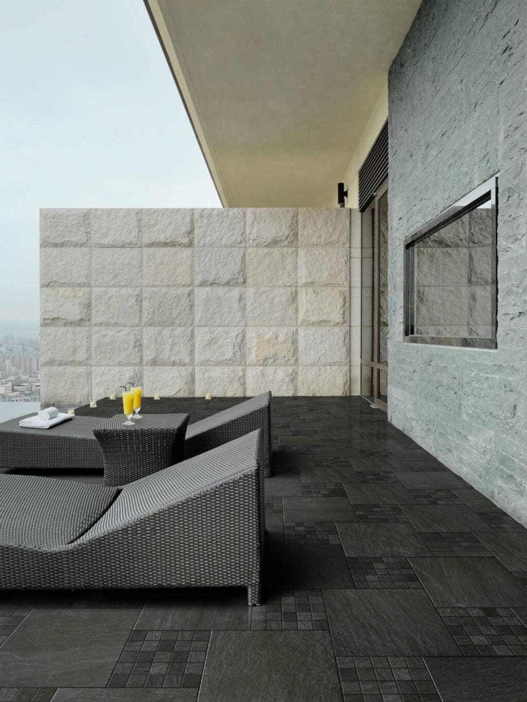 outdoor relaxation space with black stone-look tile