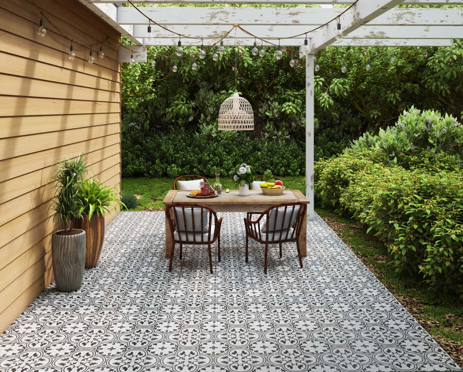 Patterned tile flooring in an outdoor dining area