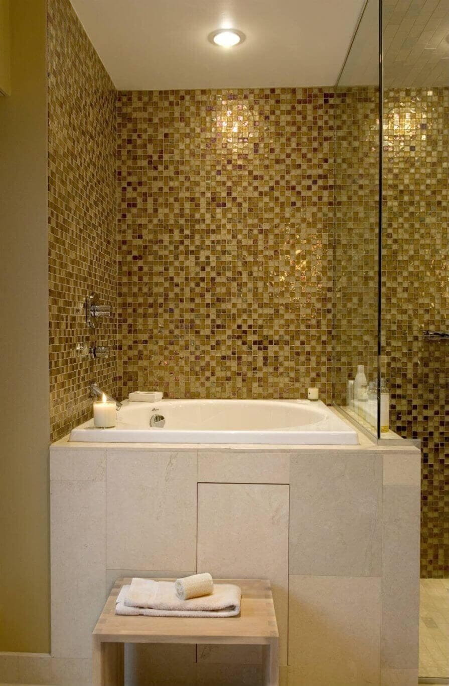 Golden square mosaic tile in a bathroom