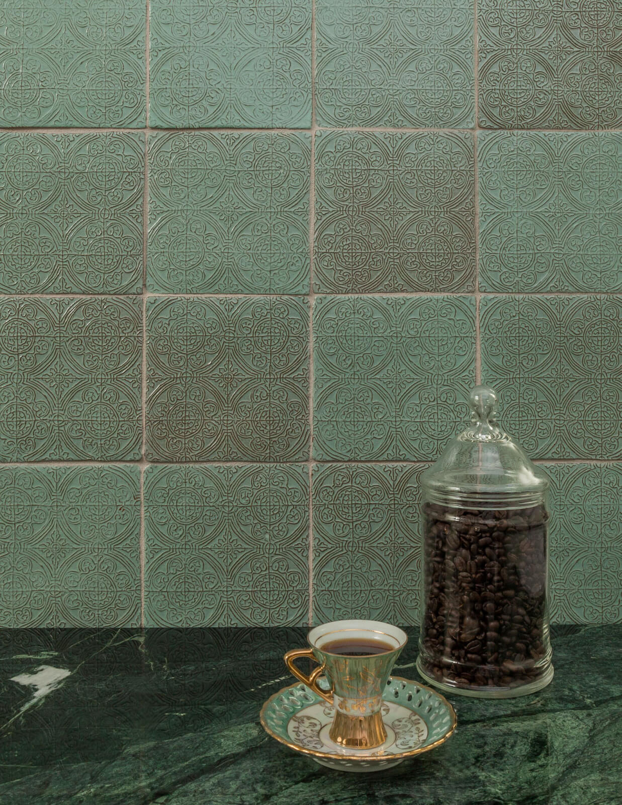Textured backsplash tile with a delicate pattern