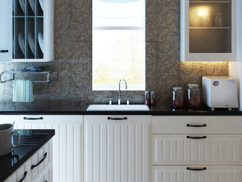 Kitchen backsplash with tiny mosaic tile grid in dark neutrals