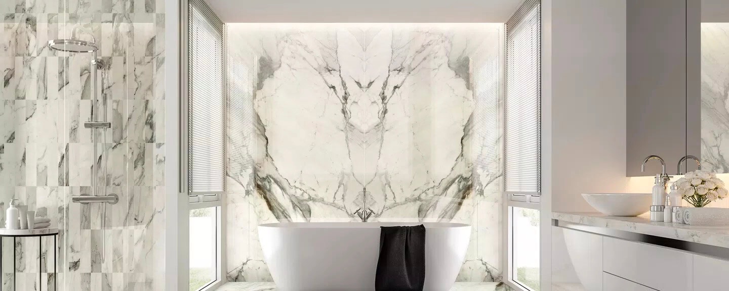 White calacatta marble-look tile with gray veining for bathroom