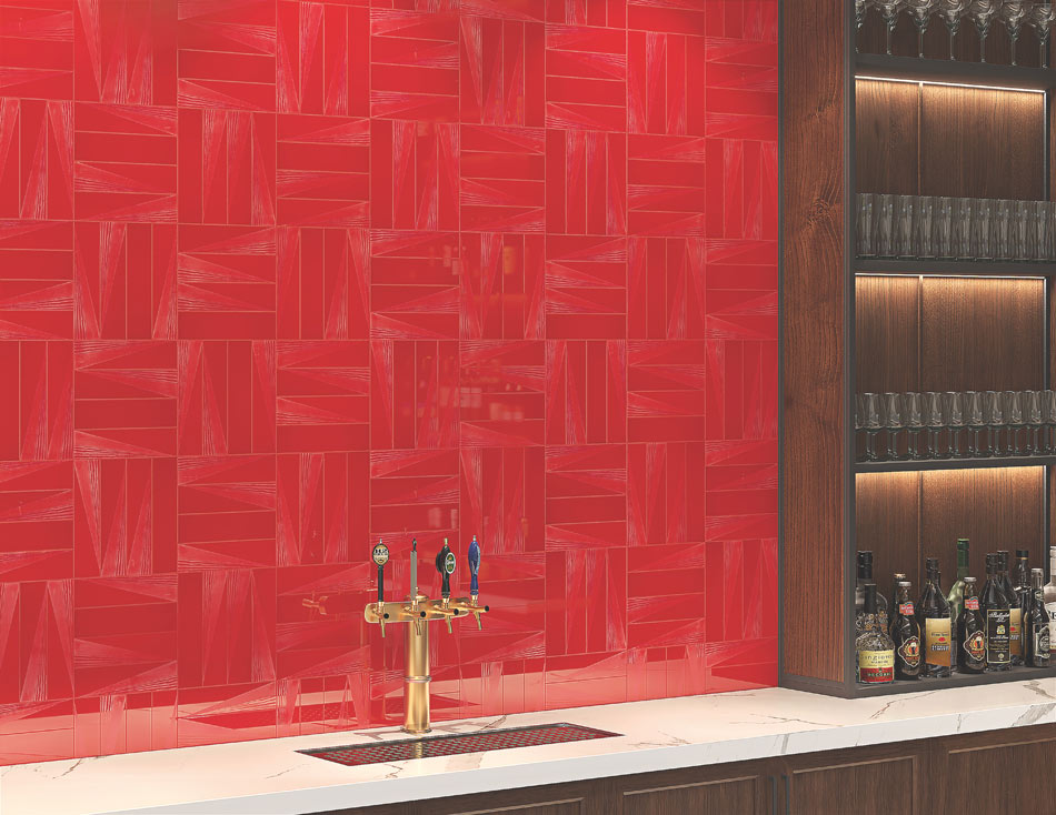Bar counter with colorful wall tile, bold cherry tile accent and brass beer taps