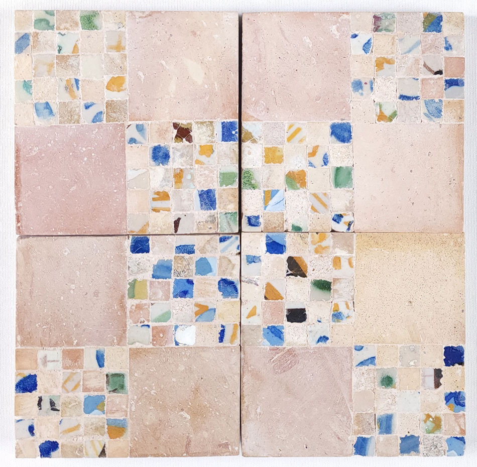Colorful Tile Close-ups: Mosaic panel with large pale pink-beige tiles and small blue, green, yellow and white mosaic tile insets
