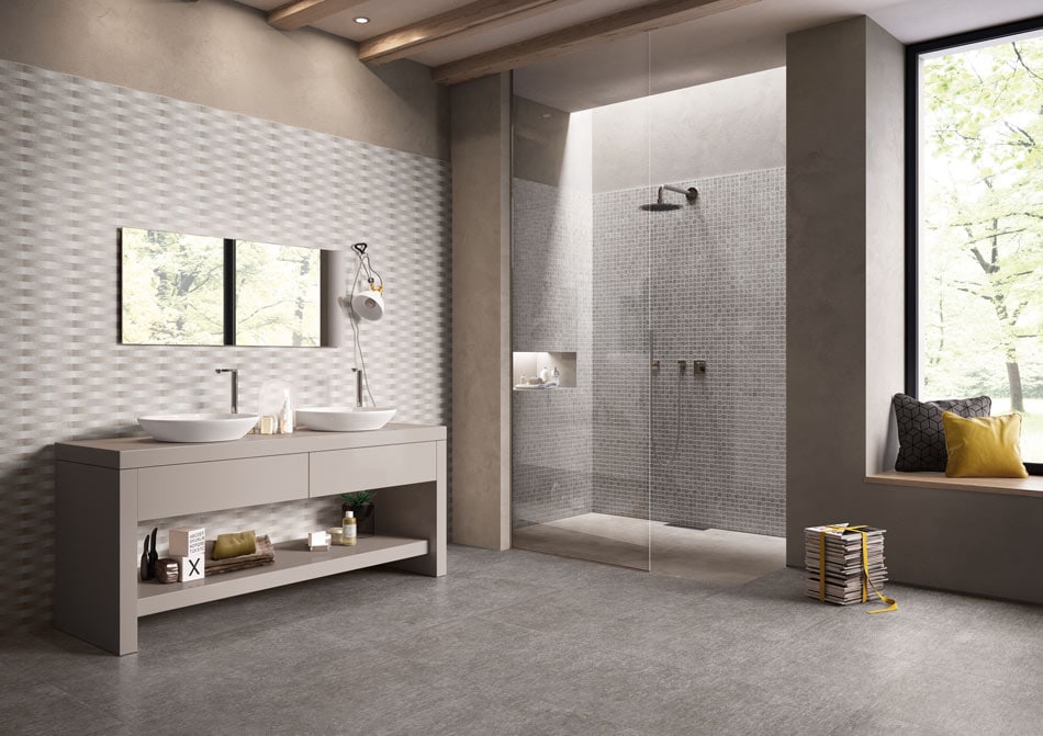 Mosaic and woven-pattern tile details in a modern gray bathroom