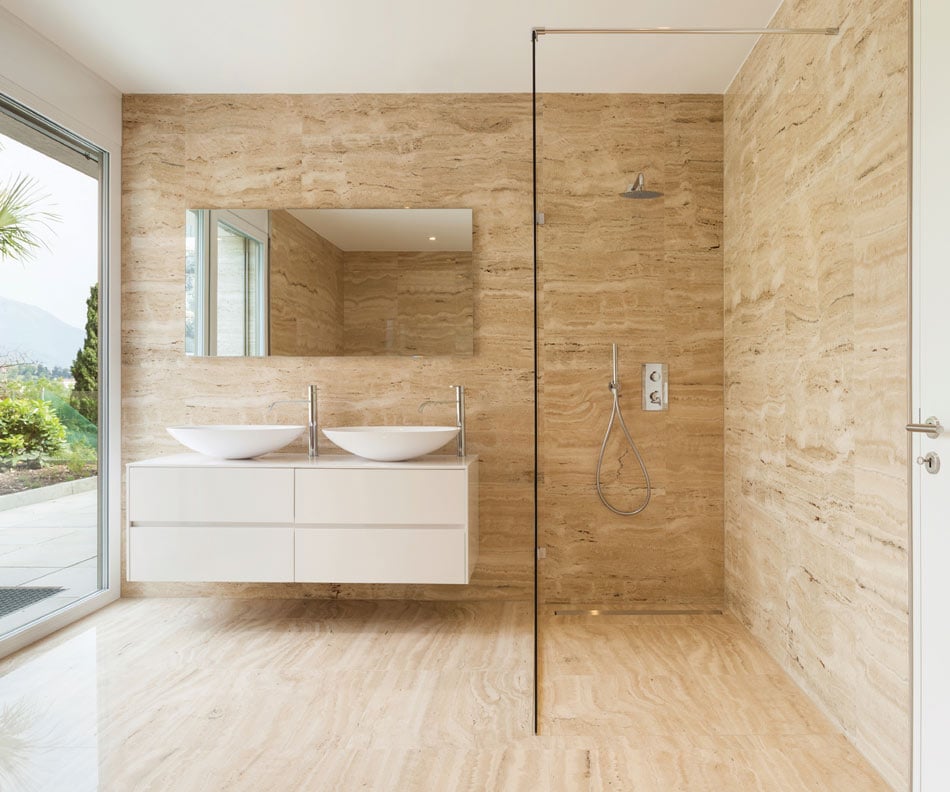 Golden wood-look tile unifying an open-concept bathroom