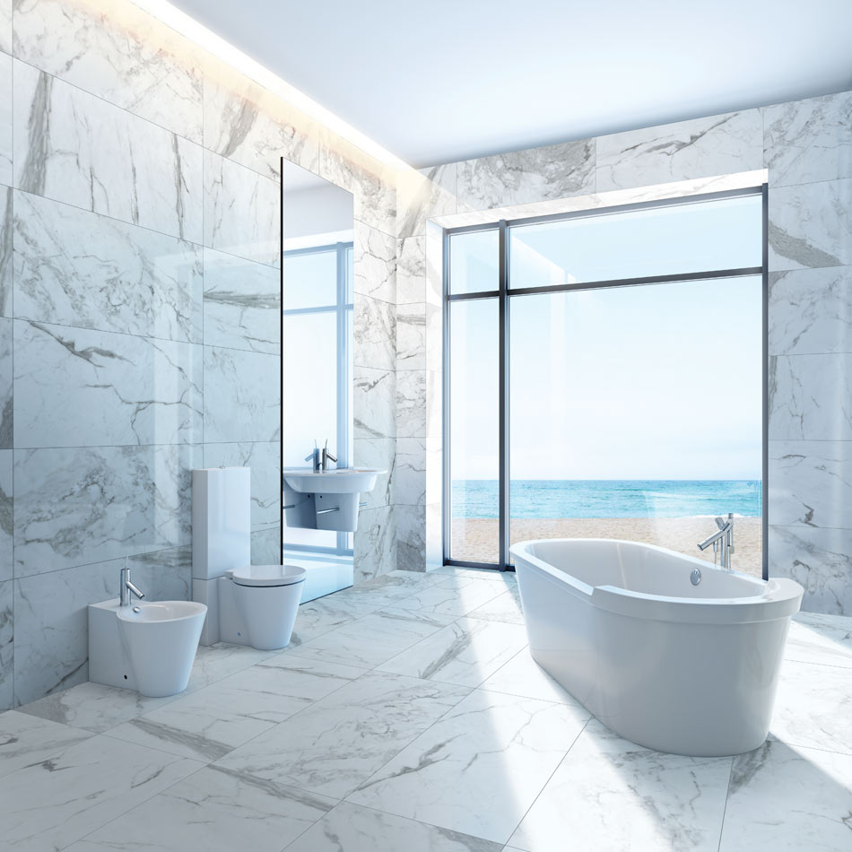 Open-concept bathroom with cool-white marble-look tile on floors and walls and ocean view