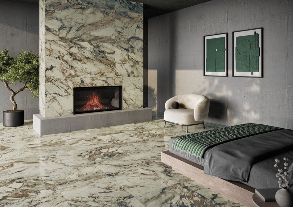 Bedroom featuring marble-look porcelain tile flooring and fireplace surround with black, ochre, and rust veining