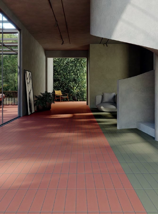 Hallway with terracotta and green tile color blocks on the floor