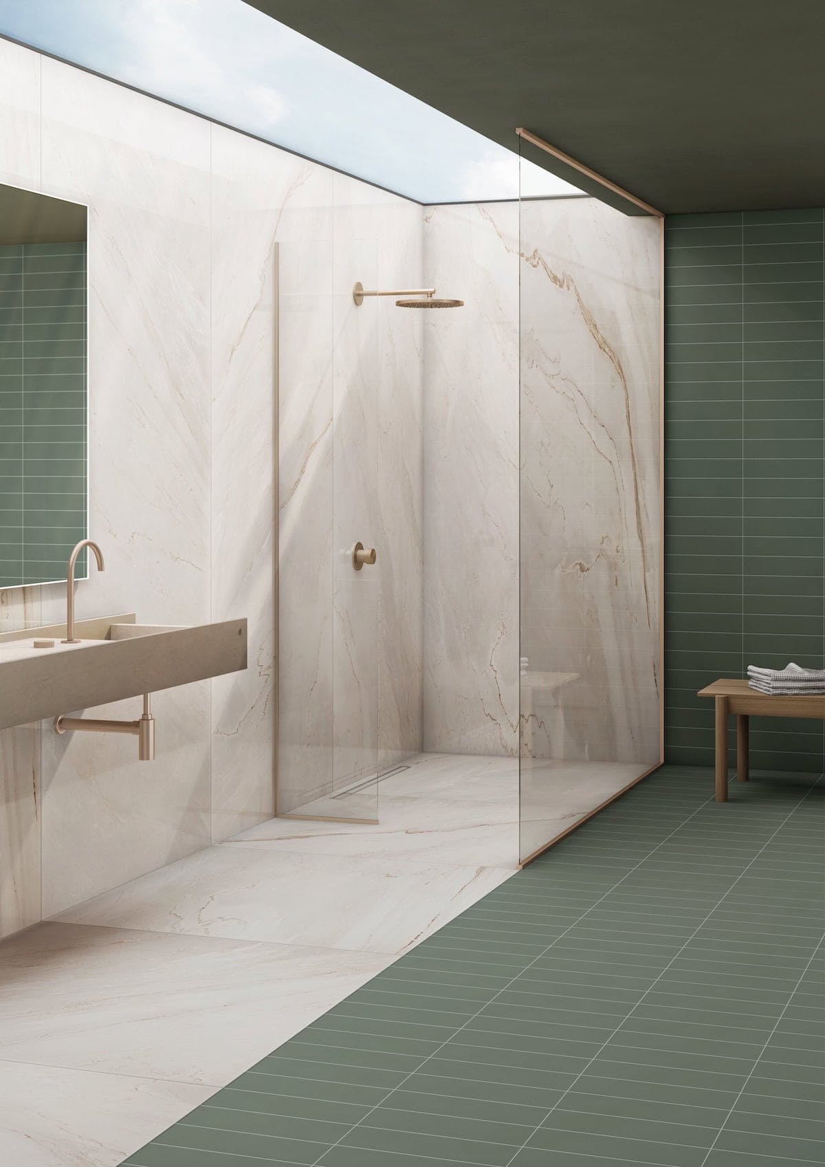 Open-concept bathroom with sage stacked subway tile and large-format ivory marble-look tile dividing wet and dry zones