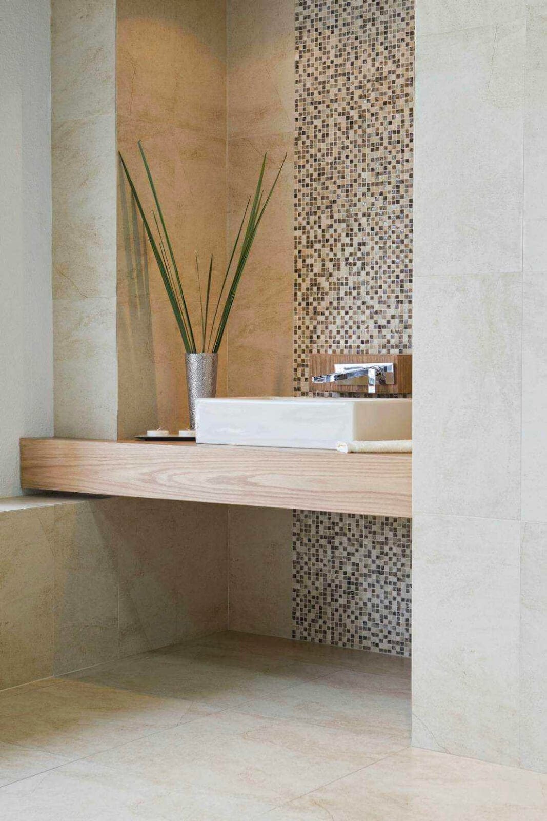 Bathroom sink with earth-toned mosaic tile grid