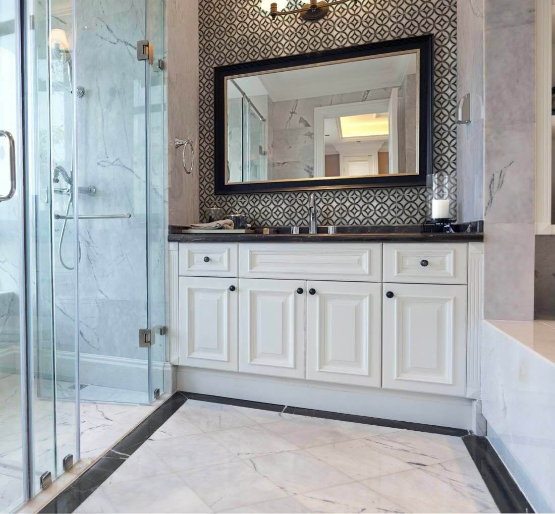 Spacious black and white tile backsplash pattern with circles and diamonds for bathroom