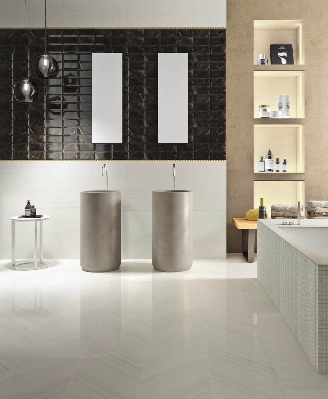 Spacious black and white stone-look tile bathroom accented with golden tile borders